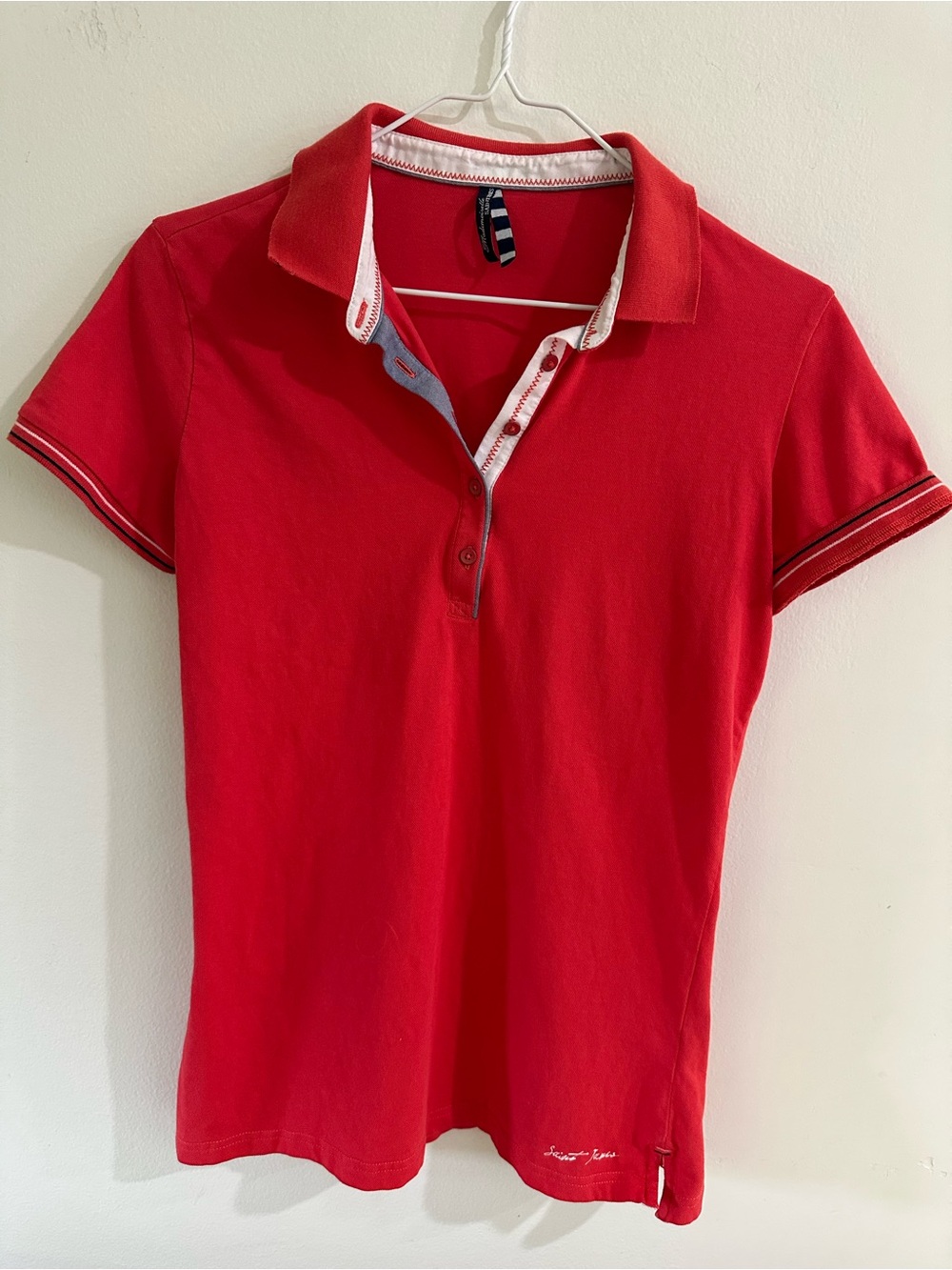 Mademoiselle Saint James red polo shirt with white trim